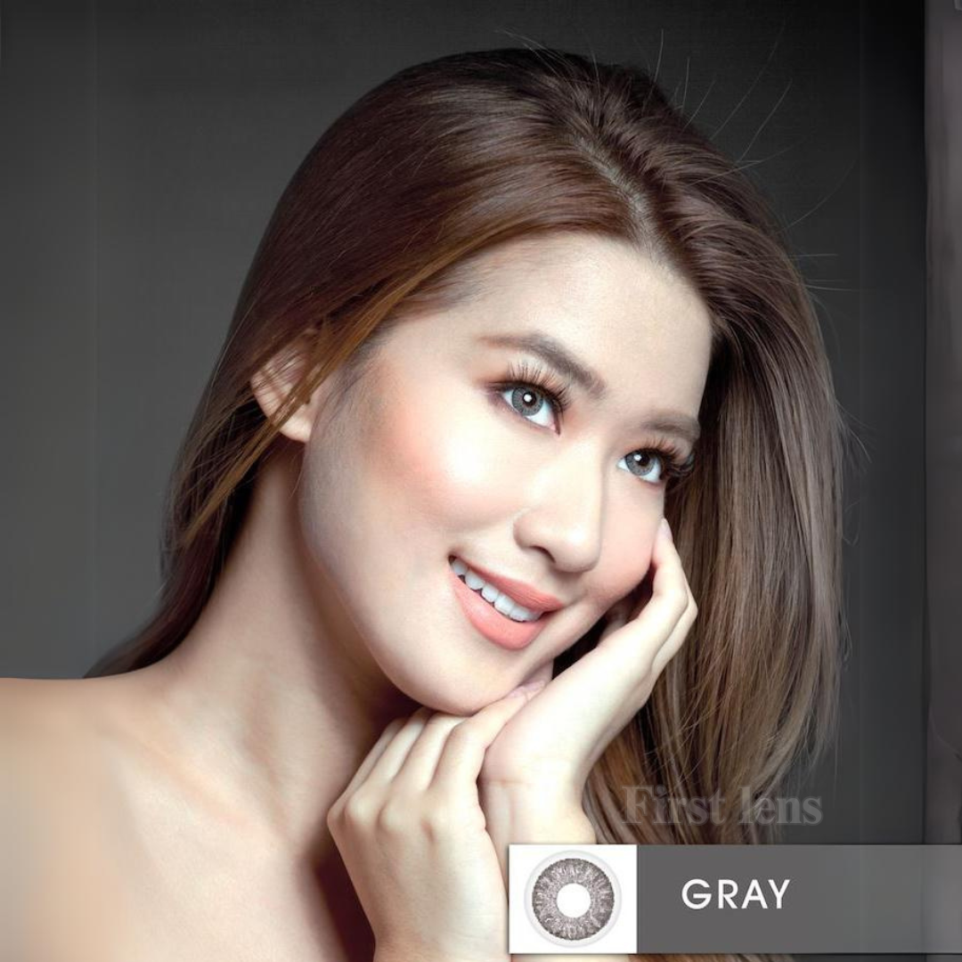 Lens21 model showcasing Gray color contacts