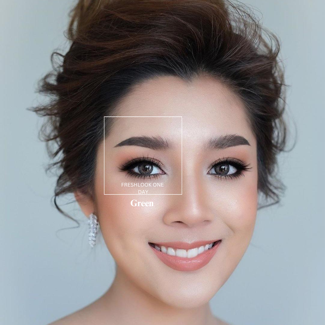 A close-up image of a person's eyes wearing the Lens21 Alcon Freshlook OneDay Color Lenses in Hazel, with the person smiling and looking off into the distance.