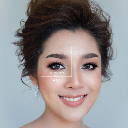 A close-up image of a person's eyes wearing the Lens21 Alcon Freshlook OneDay Color Lenses in Hazel, with the person smiling and looking off into the distance.